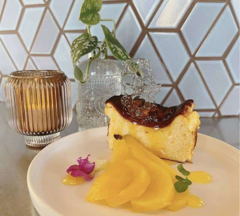 6c Gluten Free Dessert Salty egg yolk Basque cheesecake with saffron white wine poached pear 1